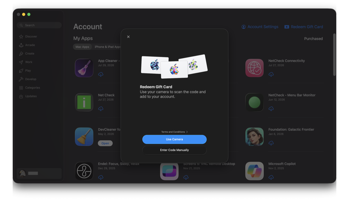 A Redeem Gift Card screen with two options: Use Camera and Enter Code Manually